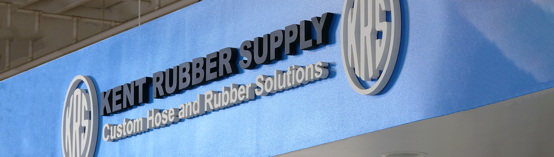 This is an image of the Kent Rubbery Supply sign